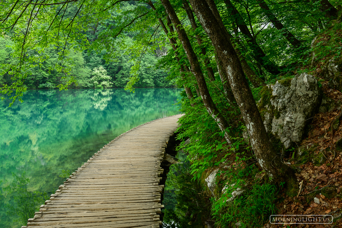 Walk with me along the still aqua colored lakes of Plitvice National Park in Croatia.