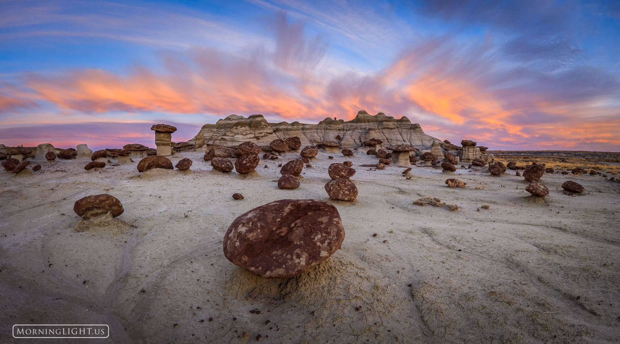 As day breaks over the desert of the Bisti Wilderness in New Mexico the world  awakens to life. For a few moments, all of creation...