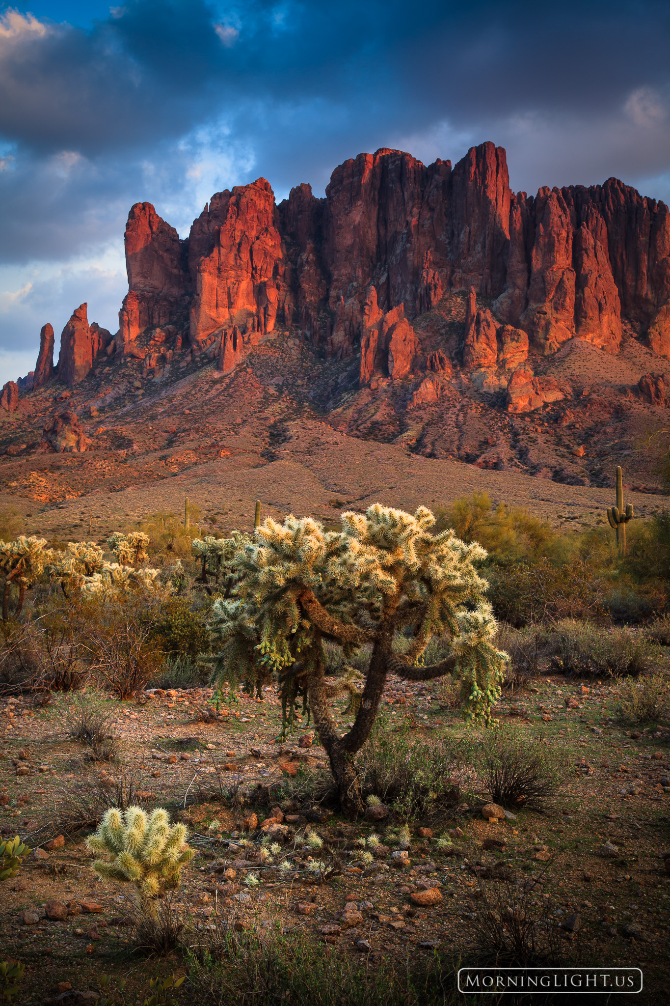 A beautiful sunset at the Superstition Mountains as seen from Lost Dutchman State Park. I chose in this one to emphasize the...