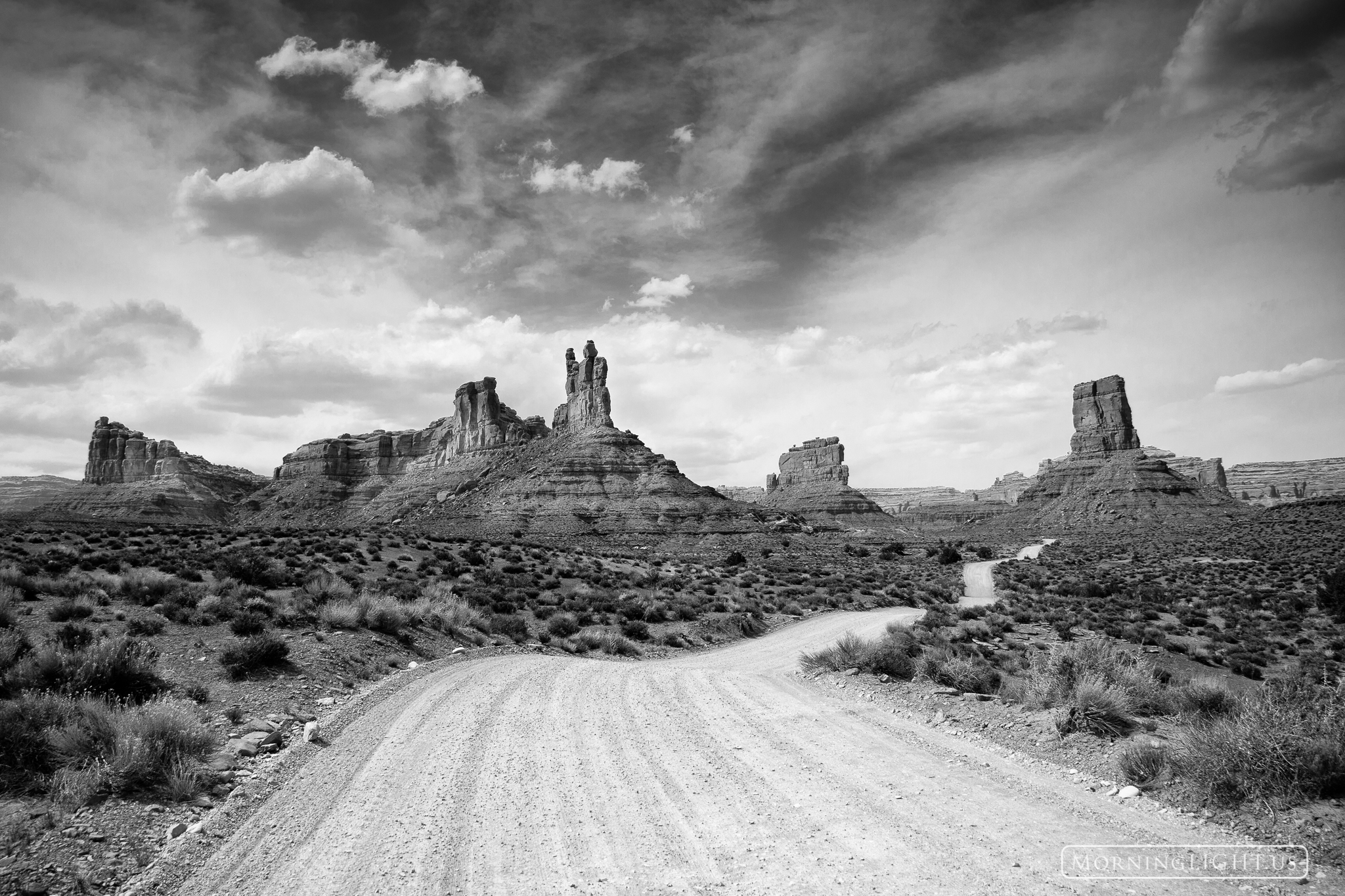 This image of a winding road in Valley of the Gods, Utah captures something of that classic desert southwest feel as the road...