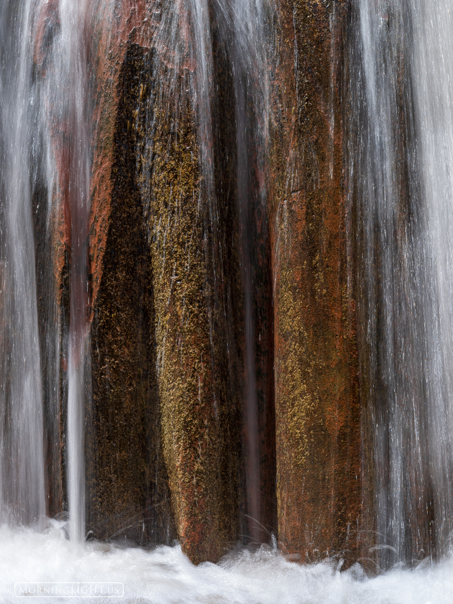 A small section of waterfall in a Utah canyon, way out in the desert.