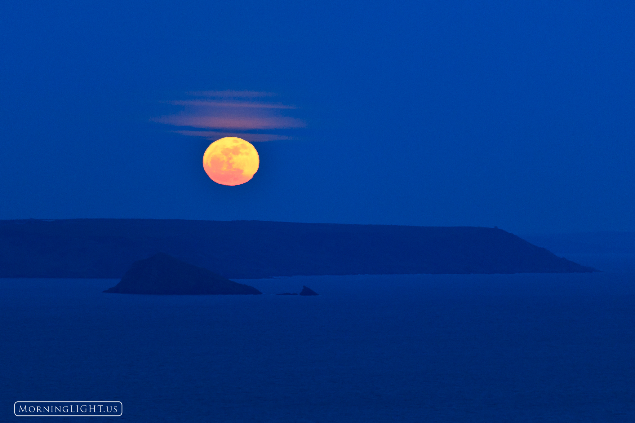 On this evening the largest moon for the next 18 years rose over Plymouth Sound in Devon, England. I was in the UK with my wife...