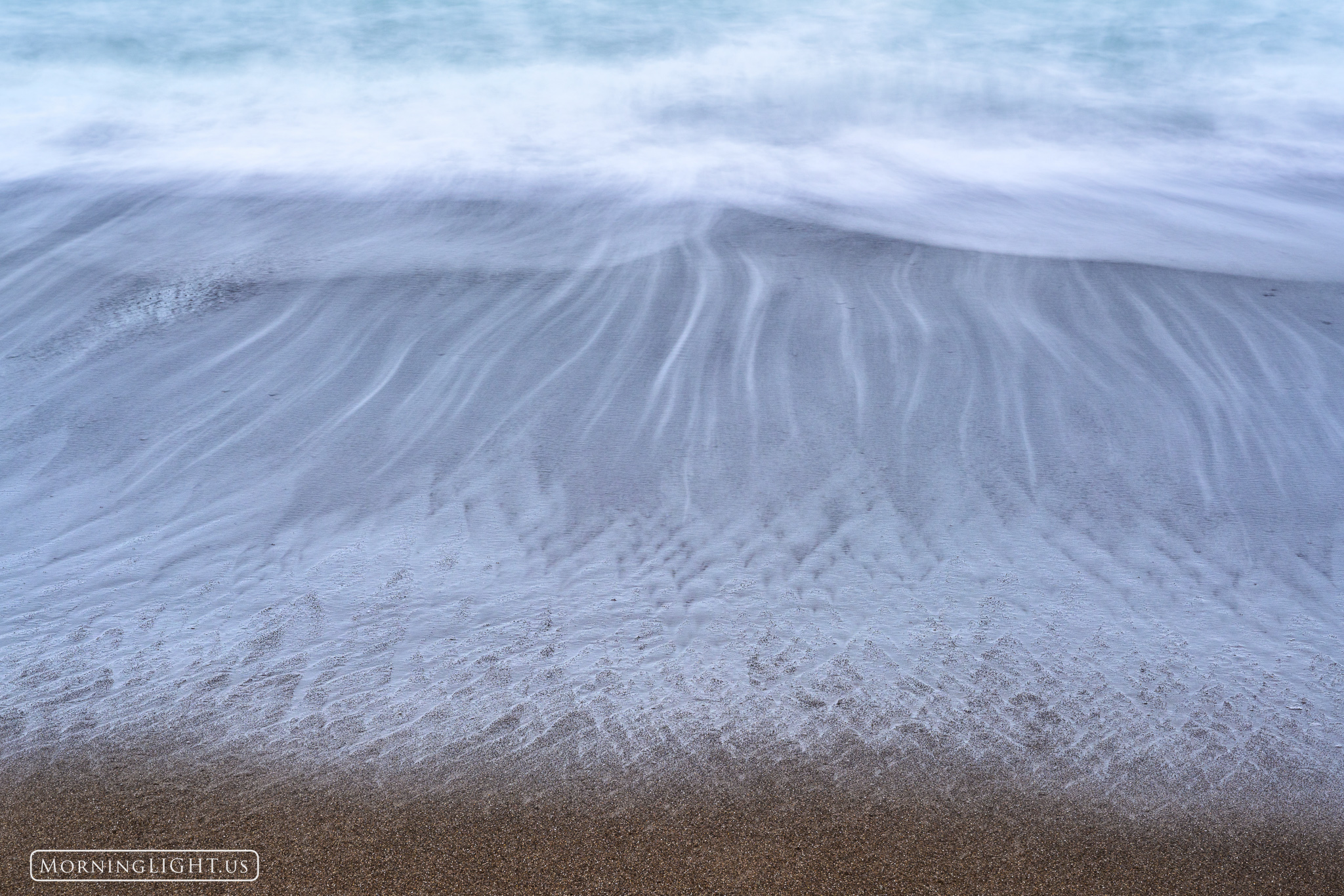 A long exposure reveals the dynamism of that place where the ocean meets the land.