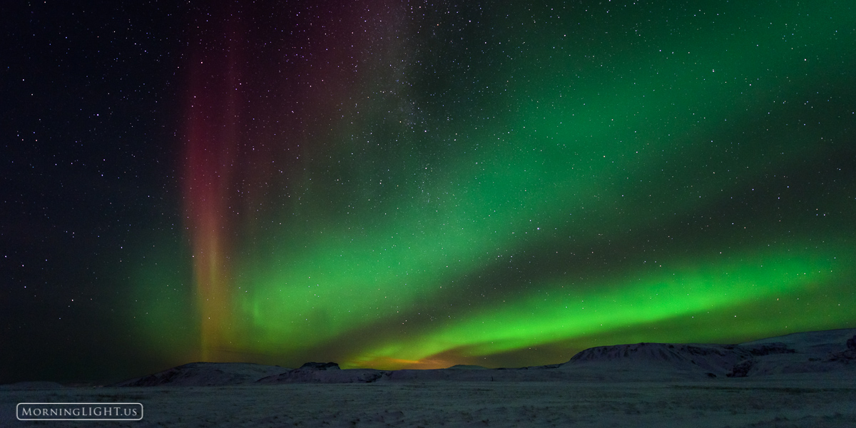 In late December, off of a lonely road in southern Iceland, I stood alone in the bitter cold and watched the aurora borealis...
