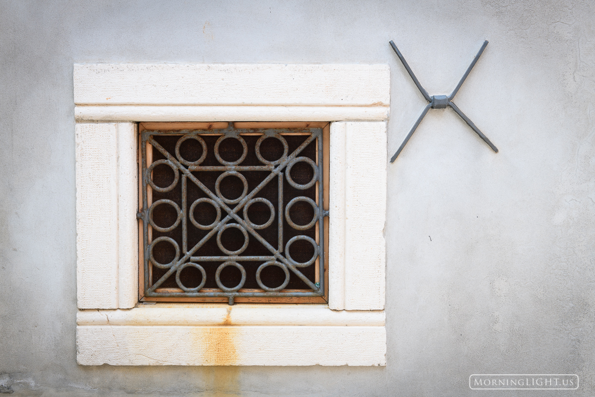 While wandering the narrow streets of the old town in Rovijn, Croatia I came across this beautiful little window.