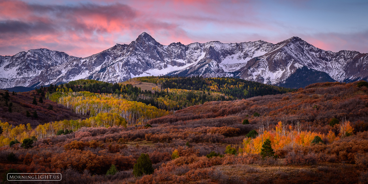 On a calm October morning the sky lit on fire with color over the Dallas Divide not far from the town of Ridgway.