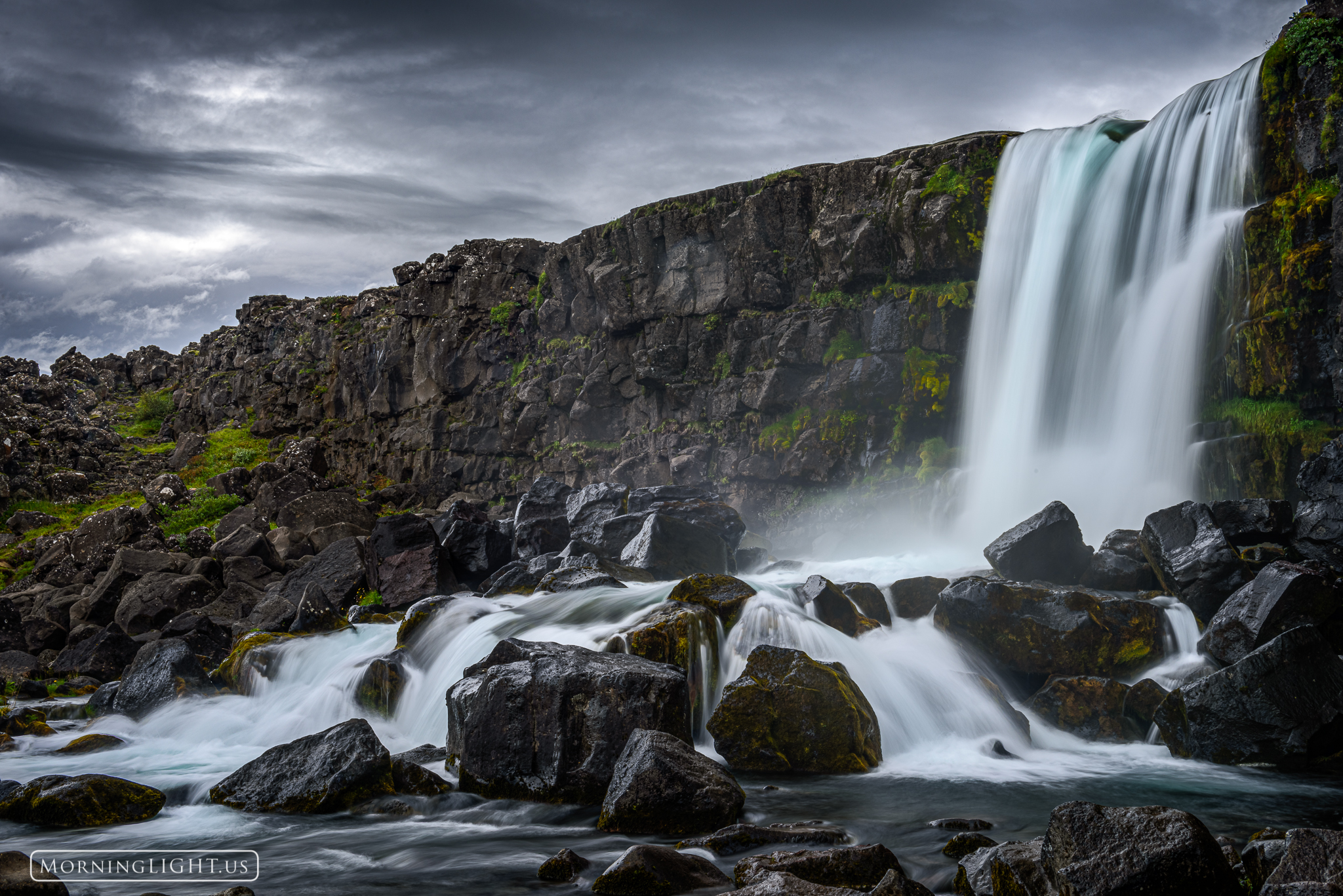 This is Öxarárfoss waterfall in Iceland's Þingvellir national park on a very stormy day. Just after I shot this the sky let...