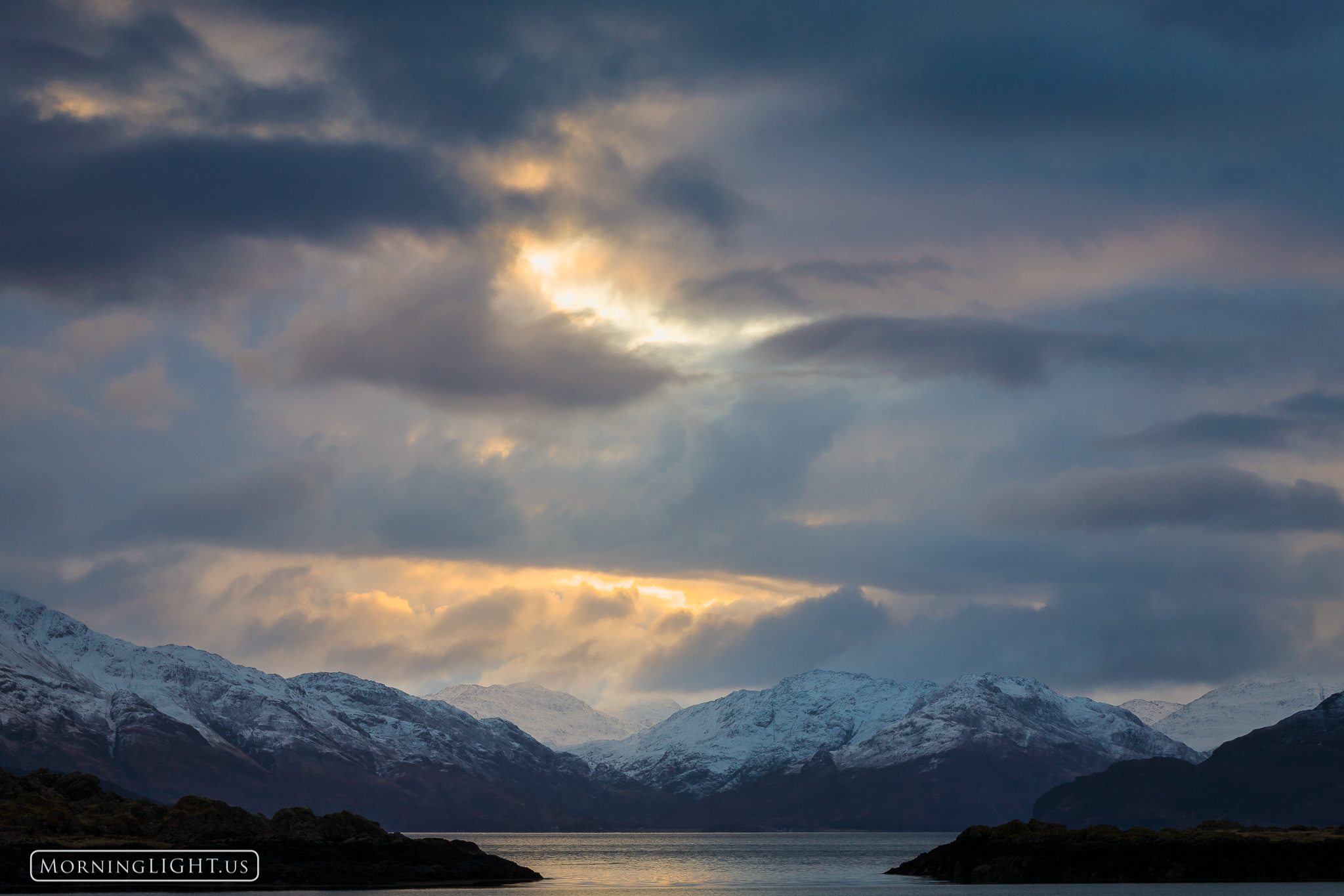 A dramatic and stormy sunrise at Camus Croise, Scotland.