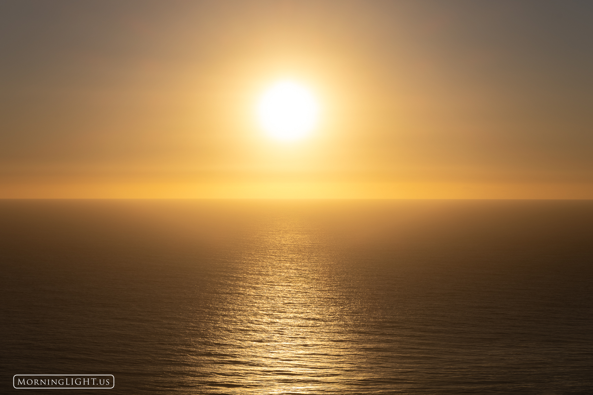 The bright orb of the sun over the ocean seems to call us out into the deep water. We find ourselves pursuing something we can...