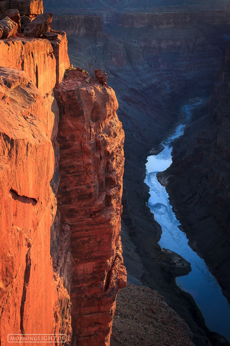 As I stood on a narrow ledge of rock and peered over the edge into the abyss, my legs began to shake. There was nothing between...