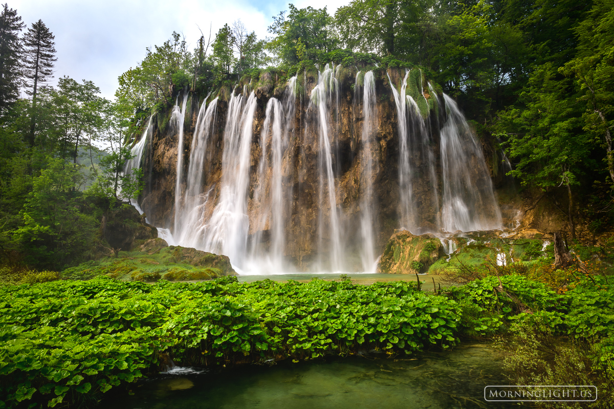 A series of falls spill off the top of a ridge in Plitvice Lakes National Park.